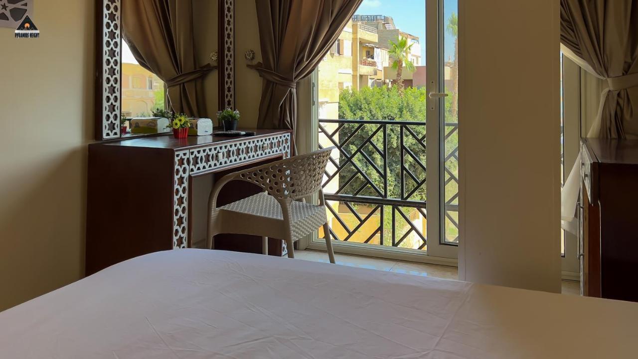Pyramids Height & Pyramids Master Scene Rooftop فندق Kafret el-Gabal